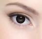 Mobile Preview: Ansicht der braunen farbigen Kontaktlinsen von LIEBEVUE auf dem Auge - Big Eye Joy Brown