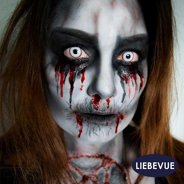Model wears the white contact lenses from LIEBEVUE - Saw White
