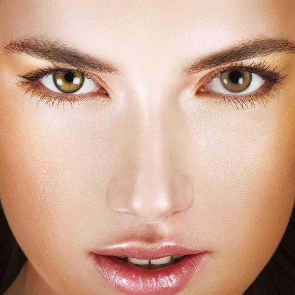 Model with coloured contact lens on one eye - Fantasy II Hazel